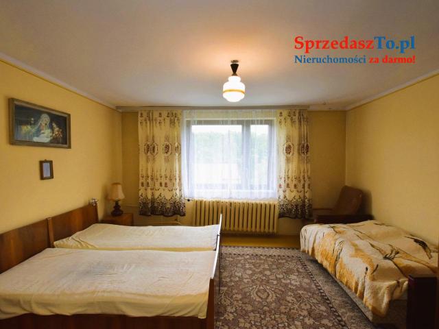 Dom w spokojnej zielonej okolicy z dużą działką - 9