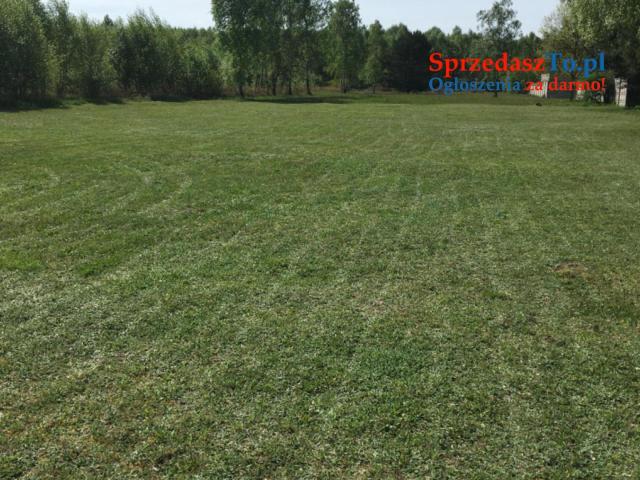 Działka budowlana 1637m2(23/84m) z projektem domu i garażu wolnostojącego.